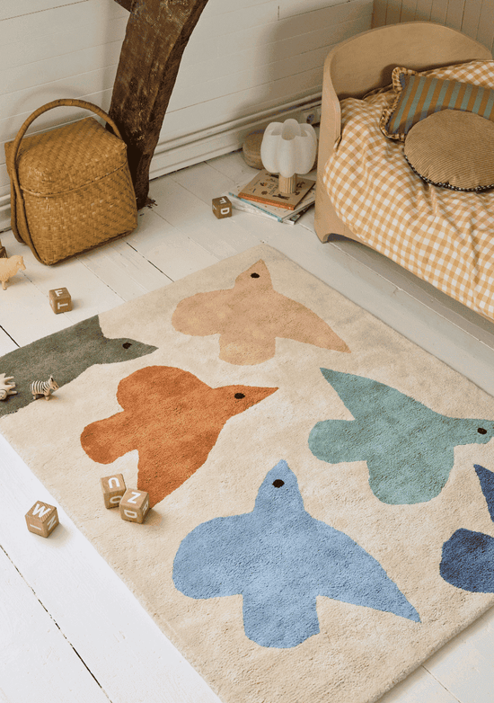 Chambre enfant 2026 : 4 ambiances déco complètes autour d'un tapis terracotta, ocre ou lilas.